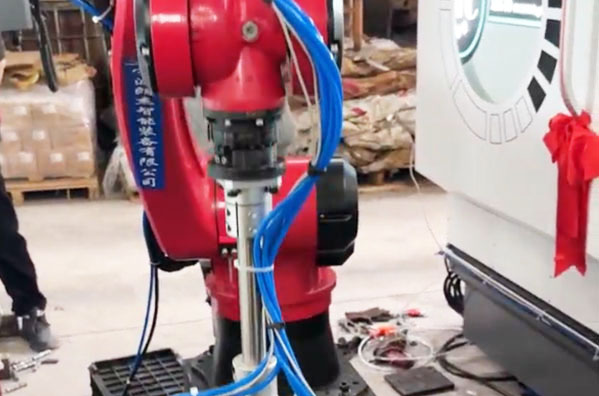 Robot-assisted Loading And Unloading Of Two Lathes